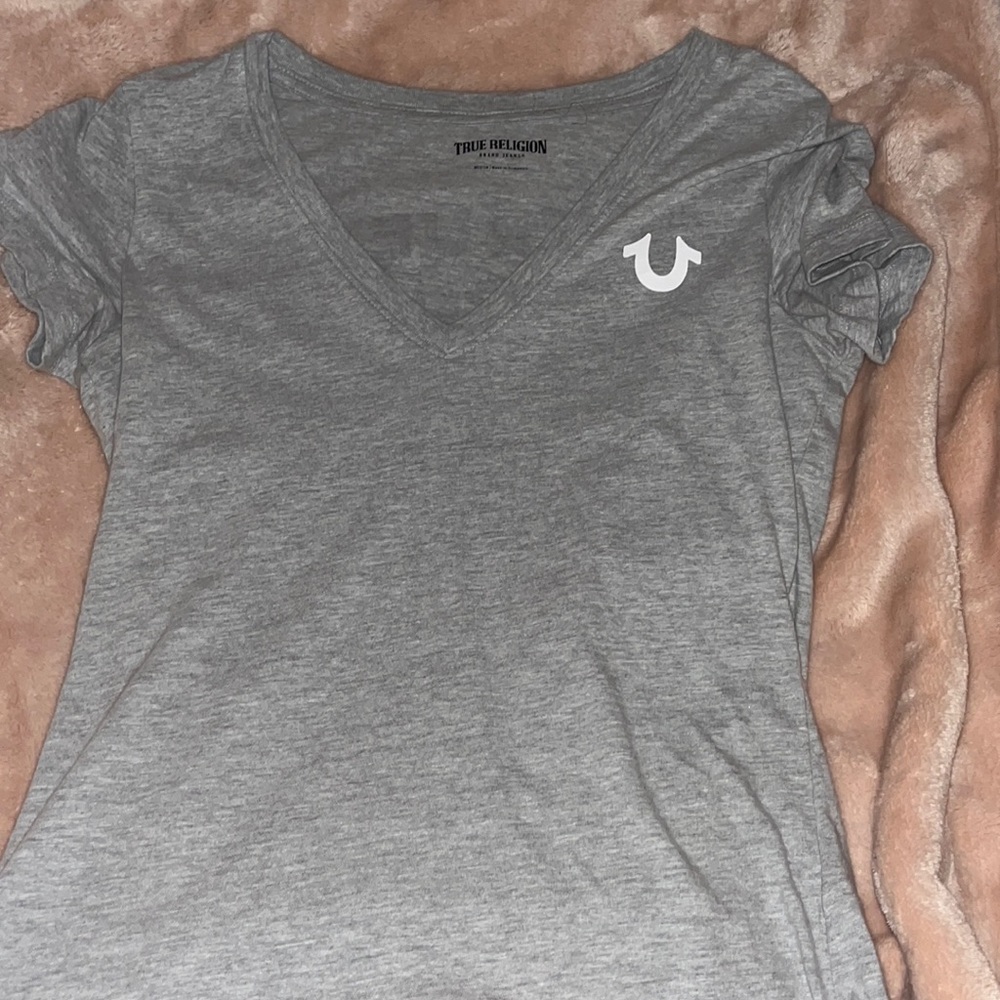 Grey shirt cotton material. Very soft and comfy.